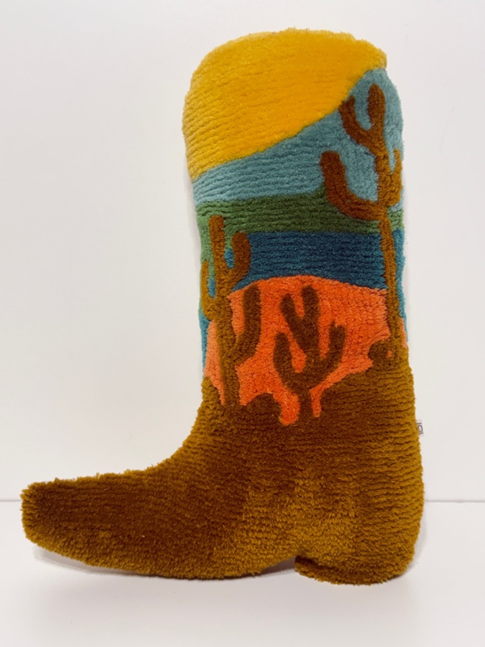 Urban Outfitters Mesa Cowboy Boot Shaped Throw Pillow Featuring a Desert Scene